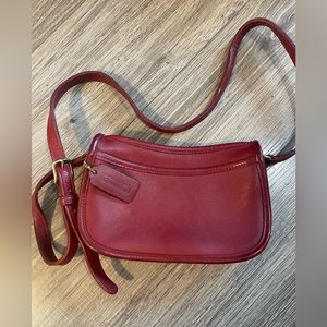 Vintage Mini Coach purse with adjustable strap. Color burgundy.